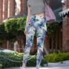 Woman casually shopping wearing comfortable NCharnt Blue and Purple Butterfly Gym Leggings