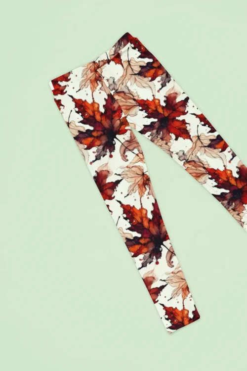 NCharnt Red and orange Maple leaf trendy yoga leggings laid out NCharnt Red and orange Maple leaf trendy yoga leggings laid out