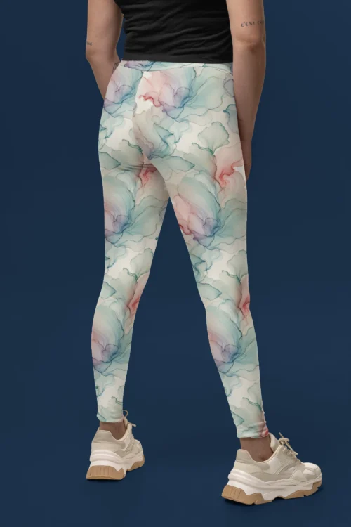 Back view of woman wearing NCharnt high-waist gym leggings in multicolour pattern Back view of woman wearing NCharnt high-waist gym leggings in multicolour pattern