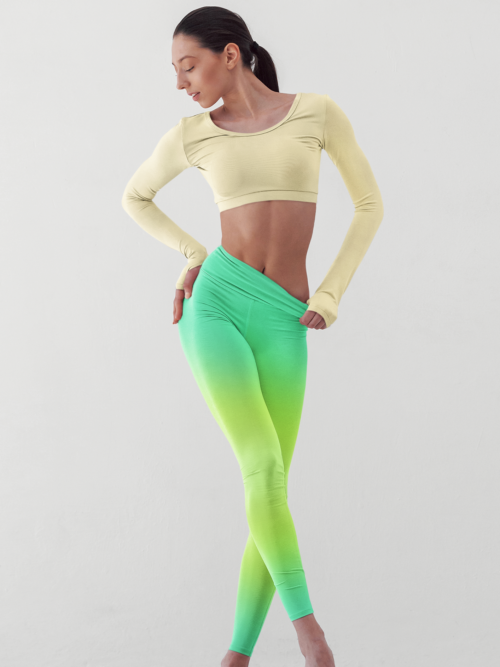Woman wearing NCharnt green and lime ombre perfect fit yoga pants posing Woman wearing NCharnt green and lime ombre perfect fit yoga pants posing