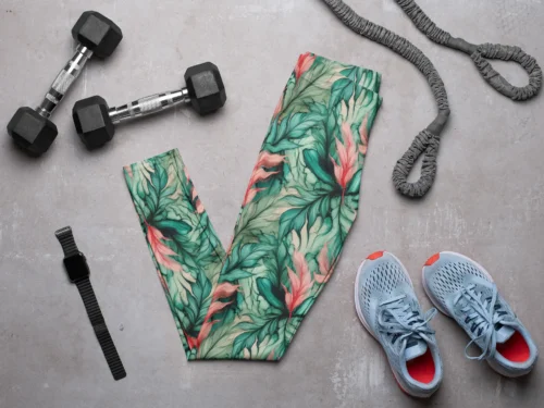 NCharnt stylish fitness leggings with green and peach leaves laid out NCharnt stylish fitness leggings with green and peach leaves laid out