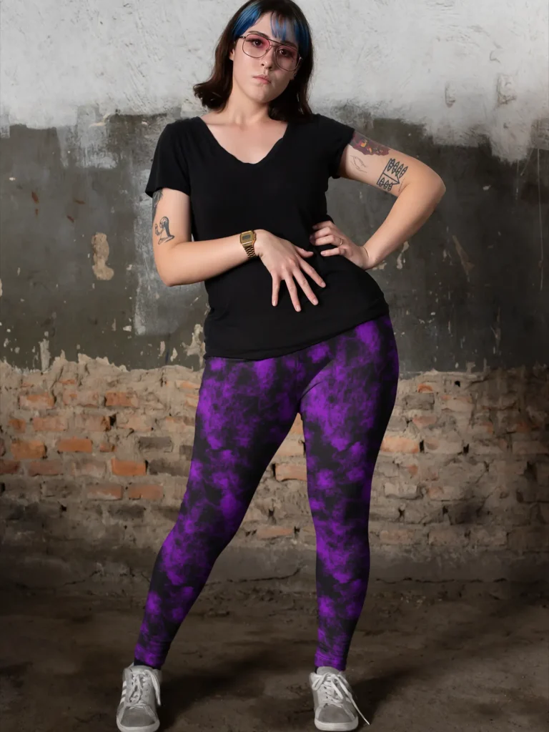 Woman in blue hair wearing NCharnt texture print gym wear in purple and black