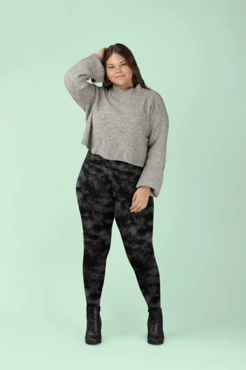 Woman posing in NCharnt Grey and Black textur print leggings Woman posing in NCharnt Grey and Black textur print leggings